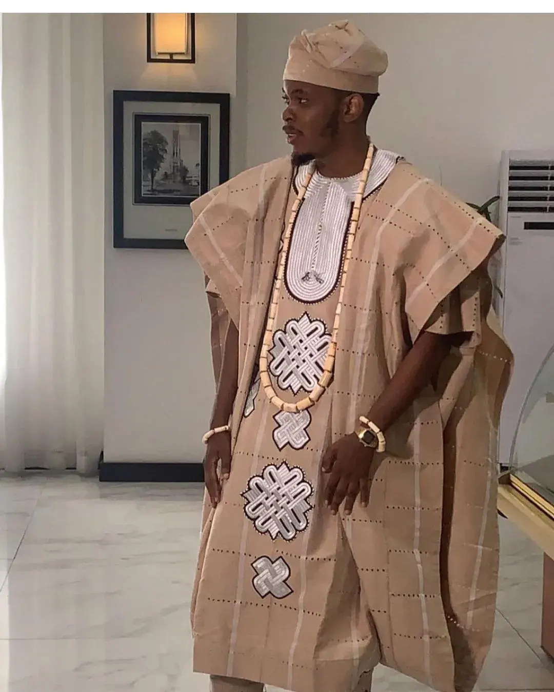 Sand-toned agbada with embroidered front panel